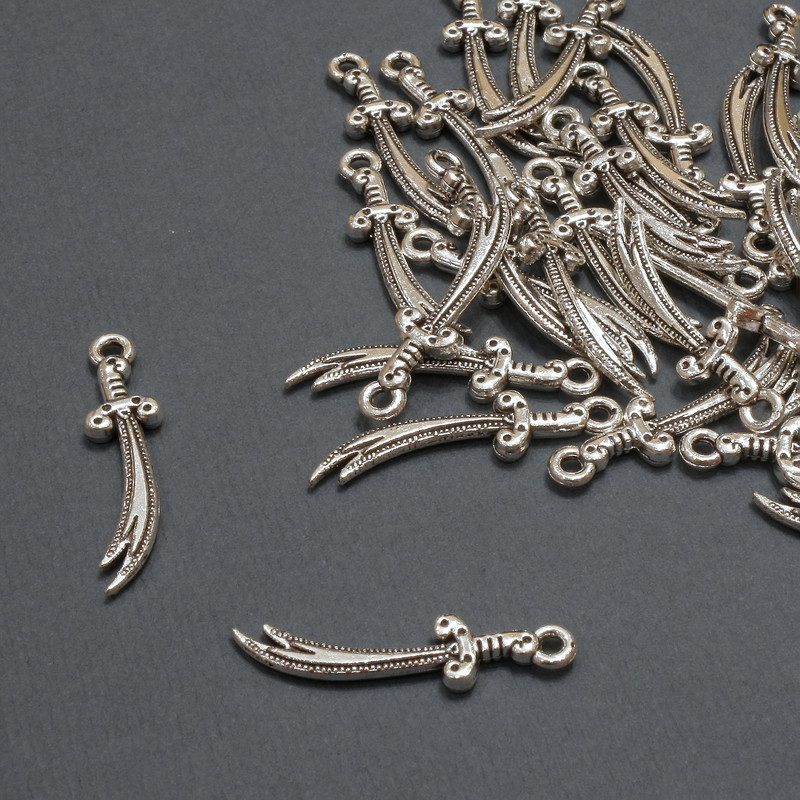 Přívěšek šavle, průměr 6×24,5 mm, 5 mm ±, balení 20 g 36 ks (+ -)