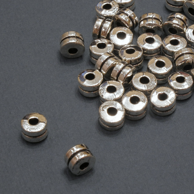 Korálka-vložka vnitřní, průměr 2,1 mm + -, průměr 6×4 mm + - balení 20 g 31 ks (+ -)