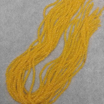 Korálky Český křišťál žluté průsvitné broušené rondely, průměr 3×2,5 mm, délka 40 mm na niti