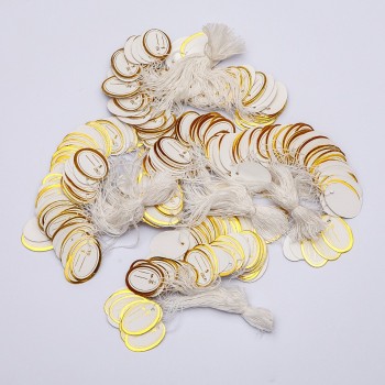 Cenovka na niti 26×17 mm ± 100 ks