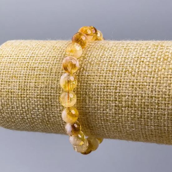 Náramek z přírodního citrínu, hladké kuličky o průměru cca 8,5 mm, délka 18 cm (na elastické bázi)