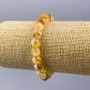 Náramek z přírodního citrínu, hladké kuličky o průměru cca 8,5 mm, délka 18 cm (na elastické bázi)