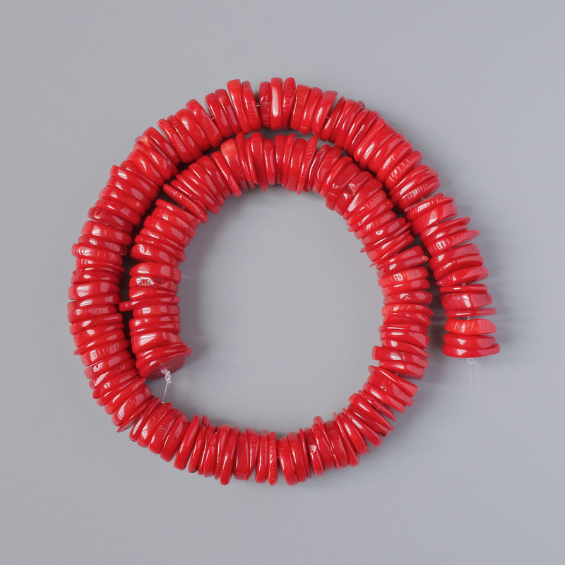 Korálky z přírodního korálu, broušené, průměr 14×4 mm, délka 40 cm ± na niti