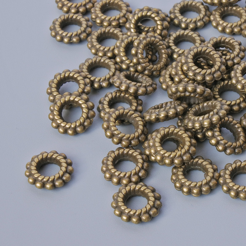 Bronzová korálková vložka, průměr 7,5×2 mm, otvor 3,3 mm, balení 54 ks, bronzová barva kovu