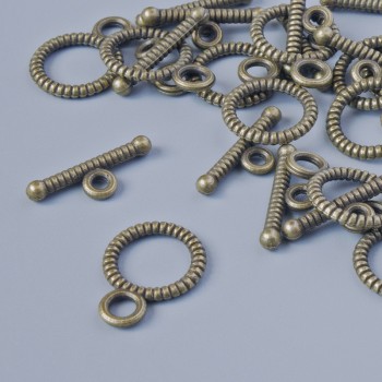 Zápínací kování, průměr 10 mm, 14,5 mm, průměr dírky 2,1 mm, balení 14 ks ±, bronzová barva kovu