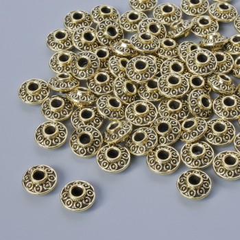 Korálky-vložky, průměr 3×6,5 mm, otvor 1,9 mm, balení 46 ks, světle zlatá barva kovu