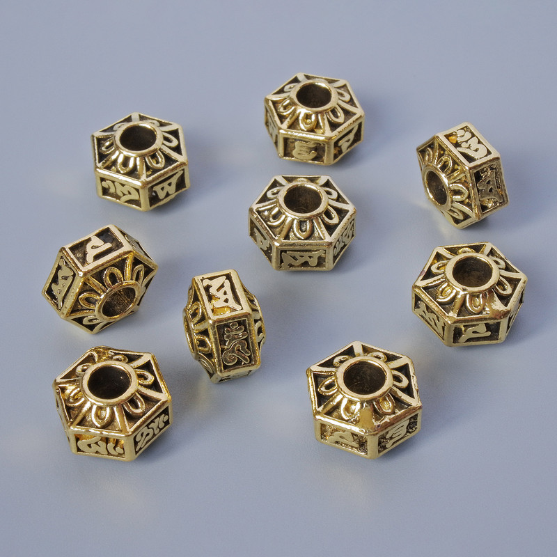 Zlatistá korálková vložka, rozměr 7×10 mm, průměr dírky 3,5 mm, balení 9 ks ± 20 g, zlatý odstín kovu
