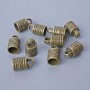 Koncovka bronzové barvy, průměr 16 × 10 mm, průměry otvorů 3,5 mm a 7,7 mm, balení 10 ks