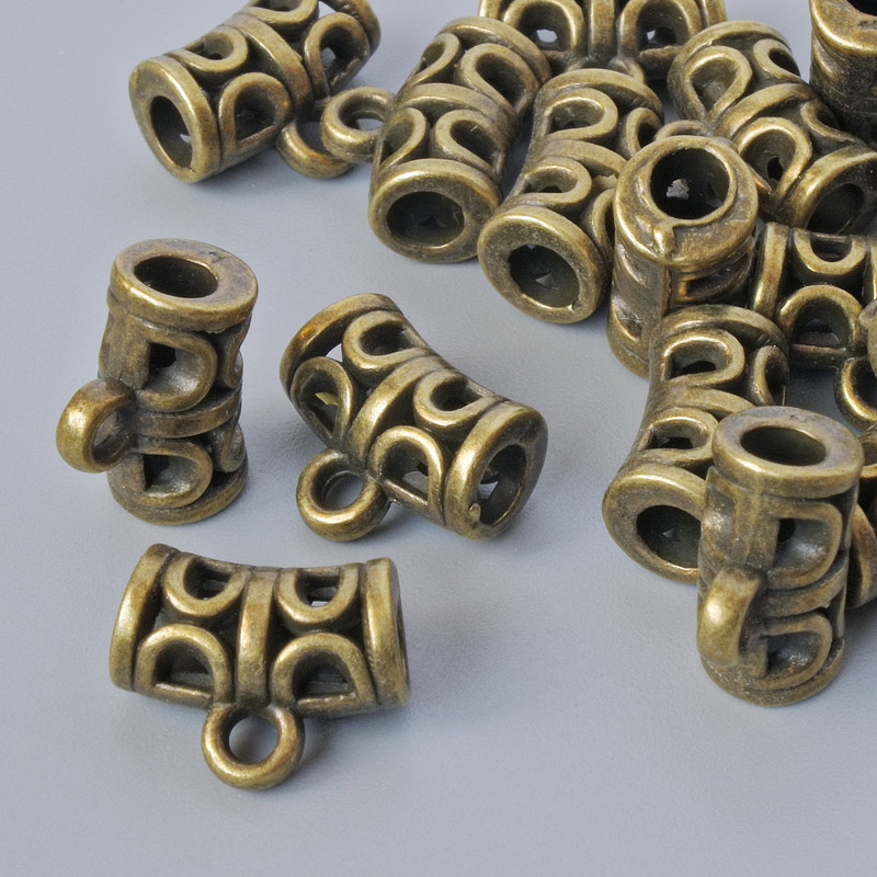 Furnitura poutko – držák, průměr 12×6 mm, průměr otvoru 1,7 mm, 3 mm, délka 9,5 mm, balení 18 ks ± bronzová barva kovu