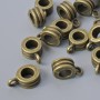 Držák poutka, průměr 4,5×8 mm, průměr otvoru 1,8 mm, délka 12 mm, balení 20 ks ± bronzová barva kovu