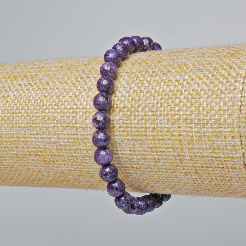 Náramek ze sugilitu – hladké kuličky, průměr 6,5 mm, délka 18 cm (elastický)