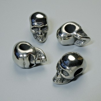Kovová komponenta korálka-vložka „Lebka“, průměr 13×9,5 mm, otvor Ø 4,7 mm, stříbrná barva kovu, 1 ks