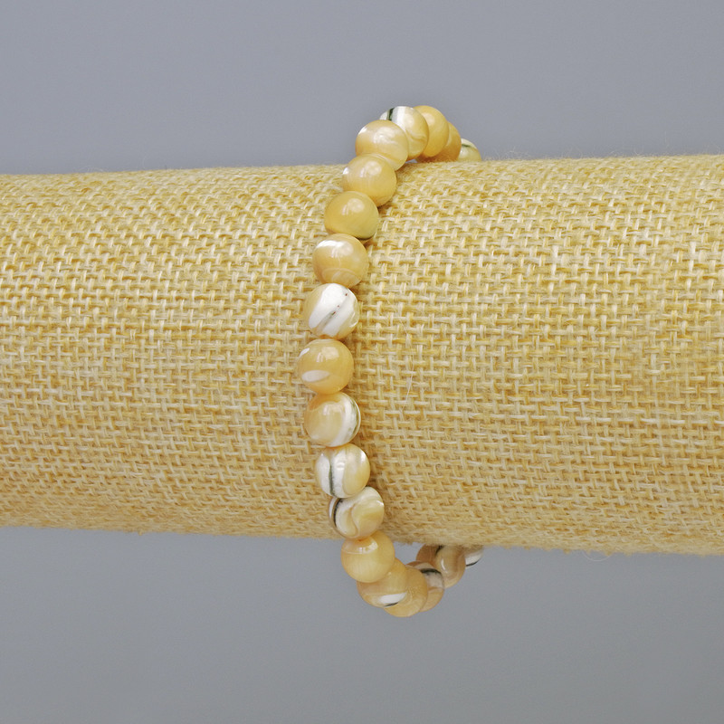 Náramek z přírodní perleti, hladká kulička, průměr cca 7 mm, na elastické šňůrce, délka 18 cm+