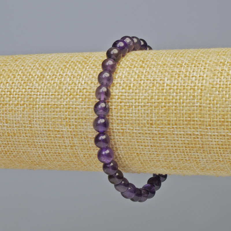 Náramek z ametystu, hladké korálky o průměru 6,5 mm ± (na elastické gumičce), délka 18 cm+