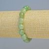 Náramek z přírodního nefritu, facetované korálky, průměr 8×10 mm ± (elastická šňůrka), délka 18 cm+