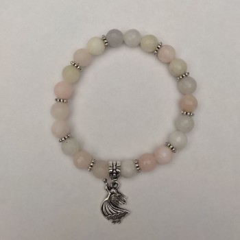 Náramek z morganitu, broušený, o průměru cca 8 mm, pružný, délka cca 18 cm, s kovovými vložkami