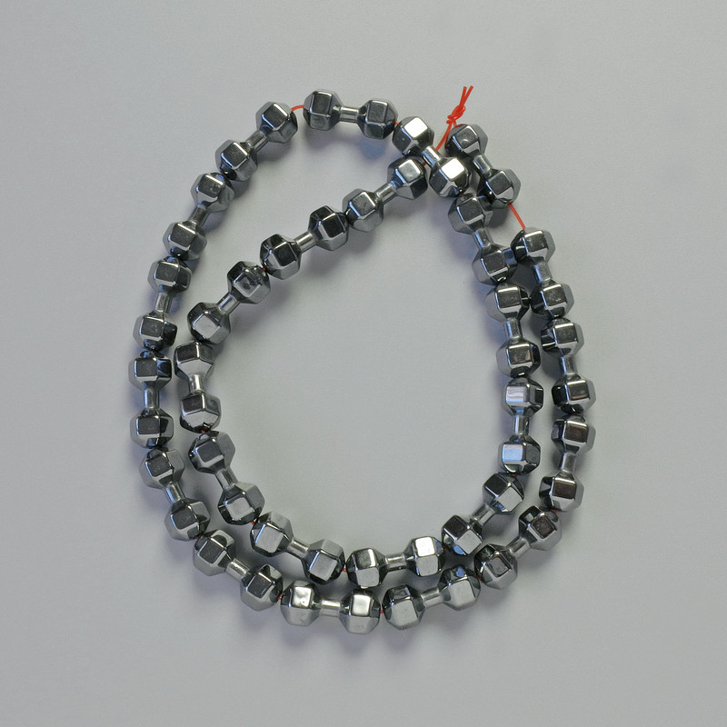 Korálky hematitu ve tvaru činky, černé, rozměry 15×6 mm, délka 40 cm