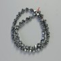 Korálky hematitu ve tvaru činky, černé, rozměry 15×6 mm, délka 40 cm