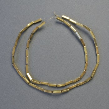 Hematitové korálky obdélníkového tvaru zlaté barvy, průměr 8×2 mm, délka cca 41 cm – šňůra