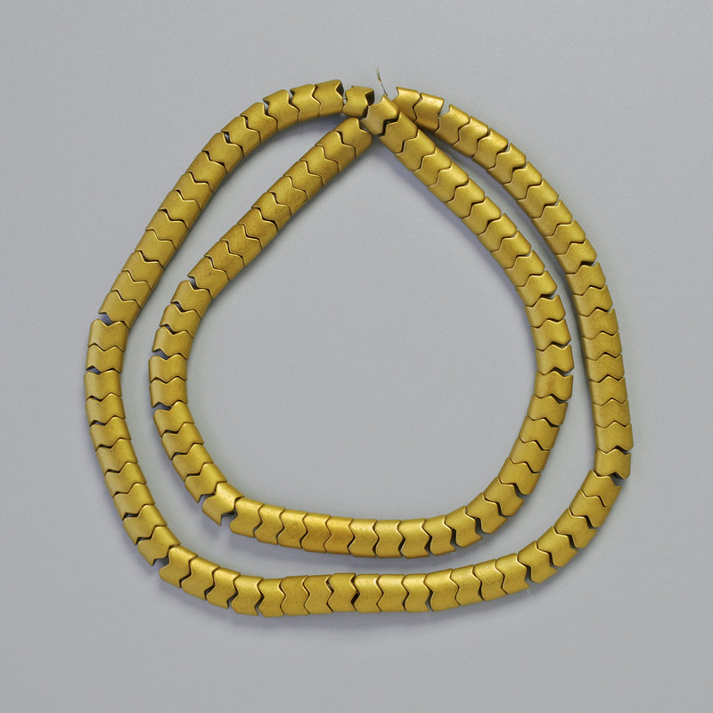 Korálky hematit – hadí vzor zigzag, barva matného zlata, průměr 5×4×3 mm, délka 40 cm