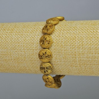 Náramek z hematitu „Dřevo“ matně zlatý odstín, průměr 12×4,5 mm, délka 18 cm ± (elastický)