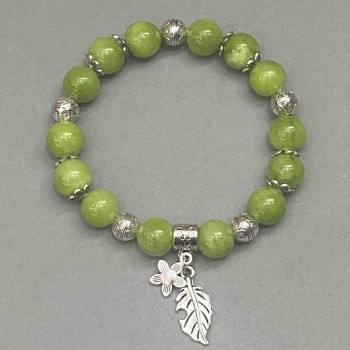 Náramek Onyx z umělého akrylu, hladké kuličky o průměru 10 mm se vsadkami, délka 18 cm, elastický.