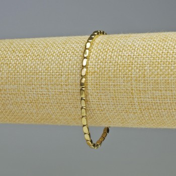 Náramek z hematitu, oválné obdélníkové korálky, zlatavý odstín, průměr 3×5 mm, délka 18 cm, elastická šňůrka