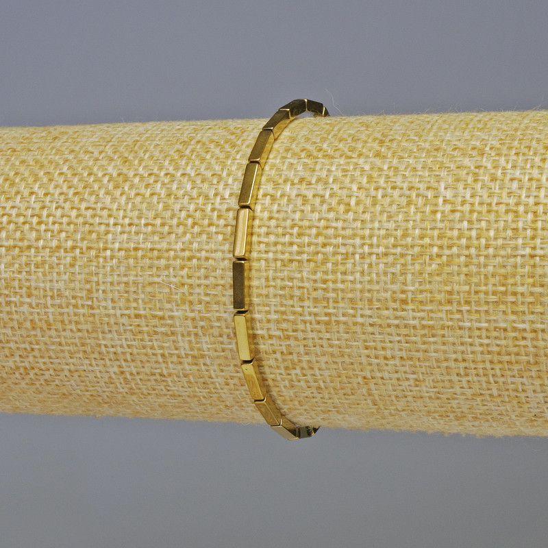 Náramek z hematitu – obdélníkové prvky, zlatá barva, průměr 7×2 mm, délka 18 cm, elastický