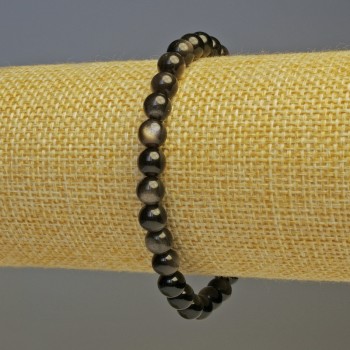 Náramek ze stříbřitého obsidiánu, hladké kuličky o průměru 6 mm, délka 18 cm, elastické provedení