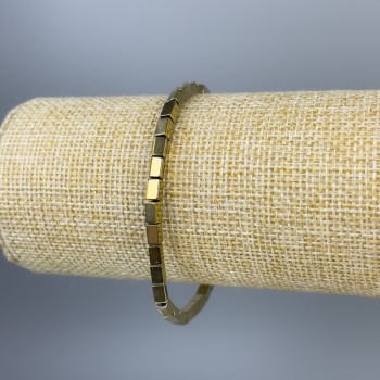 Náramek z hematitu zlatavé barvy, obdélníkové korálky, rozměr 5×3 mm, délka 18 cm, elastický