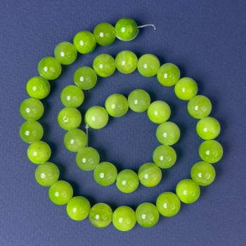 Korálky z onyxu – hladké kuličky, průměr 10 mm ±, délka cca 40 cm ± na niti