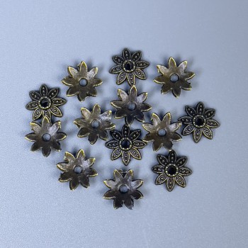 Bižuterní zakončení pro korálek, bronzová barva, průměr 7×0,5 mm, otvor 0,5 mm, balení 70 ks