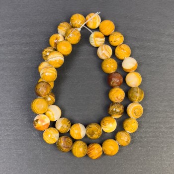 Korálky z onyxu – hladké kuličky, průměr 10 mm ±, dírka průměru cca 1,5 mm ±, délka 38 cm ±