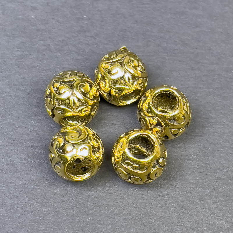 Zlatistá korálková vložka, průměr 9×10 mm, otvor cca 4,5 mm, balení 5 ks