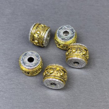 Kovová korálková vložka ve stříbrno-zlatém provedení, průměr 9×11 mm a otvor přibližně 3 mm, cena za 1 ks