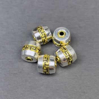 Korálka-vložka, barva kovu stříbrno-zlatá, rozměr 9,5×9,5 mm, průměr otvoru cca 2 mm, cena za 1 ks