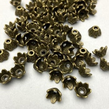 Bronzové korálkové čepičky pro korálky, průměr 7×1 mm, otvor cca 2 mm, balení cca 32 ks