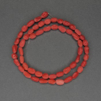 Brusované korálky z korálu, průměr 6×4 mm ± (směs velikostí), délka 40 cm ± na niti