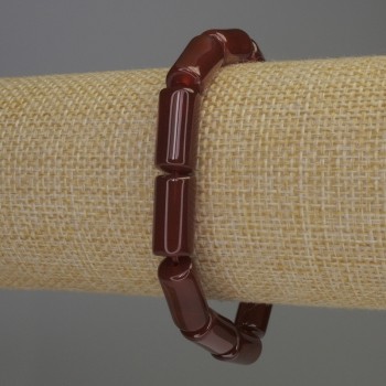 Náramek z karneolu cylindrického tvaru, průměr 15×8 mm, délka 18 cm, na pružné šňůře