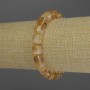Náramek z citrínu rondelů, průměr 10×6 mm ±, s drobnými rokajly o průměru 3 mm ±, délka 18 cm, elastický