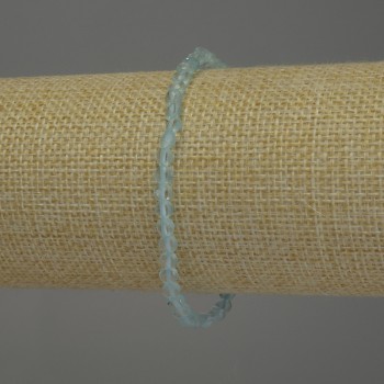 Náramek z přírodního topazu, fazetovaný korálek ve tvaru mince, průměr 4 mm, délka 18 cm, strečové provedení