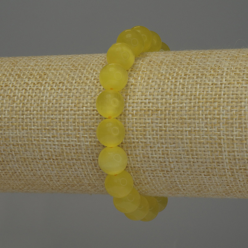 Náramek ze žlutého kočičího oka, hladké kuličky, průměr 10 mm ±, délka 18 cm ±, elastický