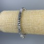 Náramek z broušeného hematitu ve stříbrném odstínu, průměr 6×3 mm, délka 18 cm, na elastické šňůrce