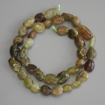 Korálky grossularu facettované na niti, průměr 9–12×9 mm, délka 40 cm ± na niti