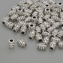 Stříbrná korálková vložka, barva kovu stříbrná, průměr 6,5×5 mm, otvor 2,5 mm, balení 20 g (~59 ks)