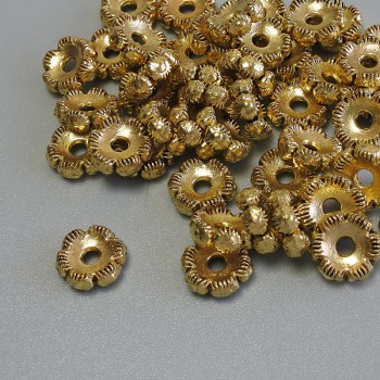 Zlatá korálka-vložka, průměr 7×3 mm, otvor 1,9 mm, balení 20 g (~44 ks)