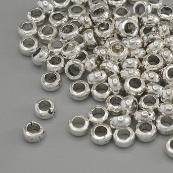 Korálka-vložka – kovová komponenta, barva kovu stříbrná, průměr 5×3 mm, dírka cca 3 mm, balení 20 g (~100 ks)