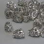 Koncovka, barva kovu stříbrná, průměr 13×10 mm ± otvor, průměr 4,5 mm ± otvor, průměr 9,5 mm ± otvor, balení 20 g (~19 ks)