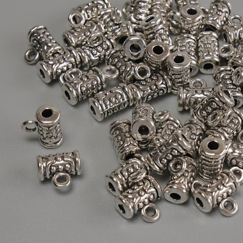 Kovové poutko, barva kovu: stříbrná, rozměr 7,5×4 mm, otvor 1,8 mm, balení 20 g (~39 ks)