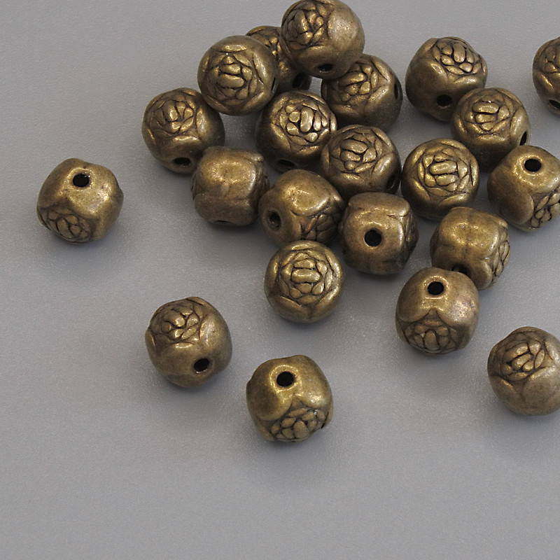 Bronzová korálka-vložka 5,5×5,5 mm, otvor 1,2 mm, balení 23 ks